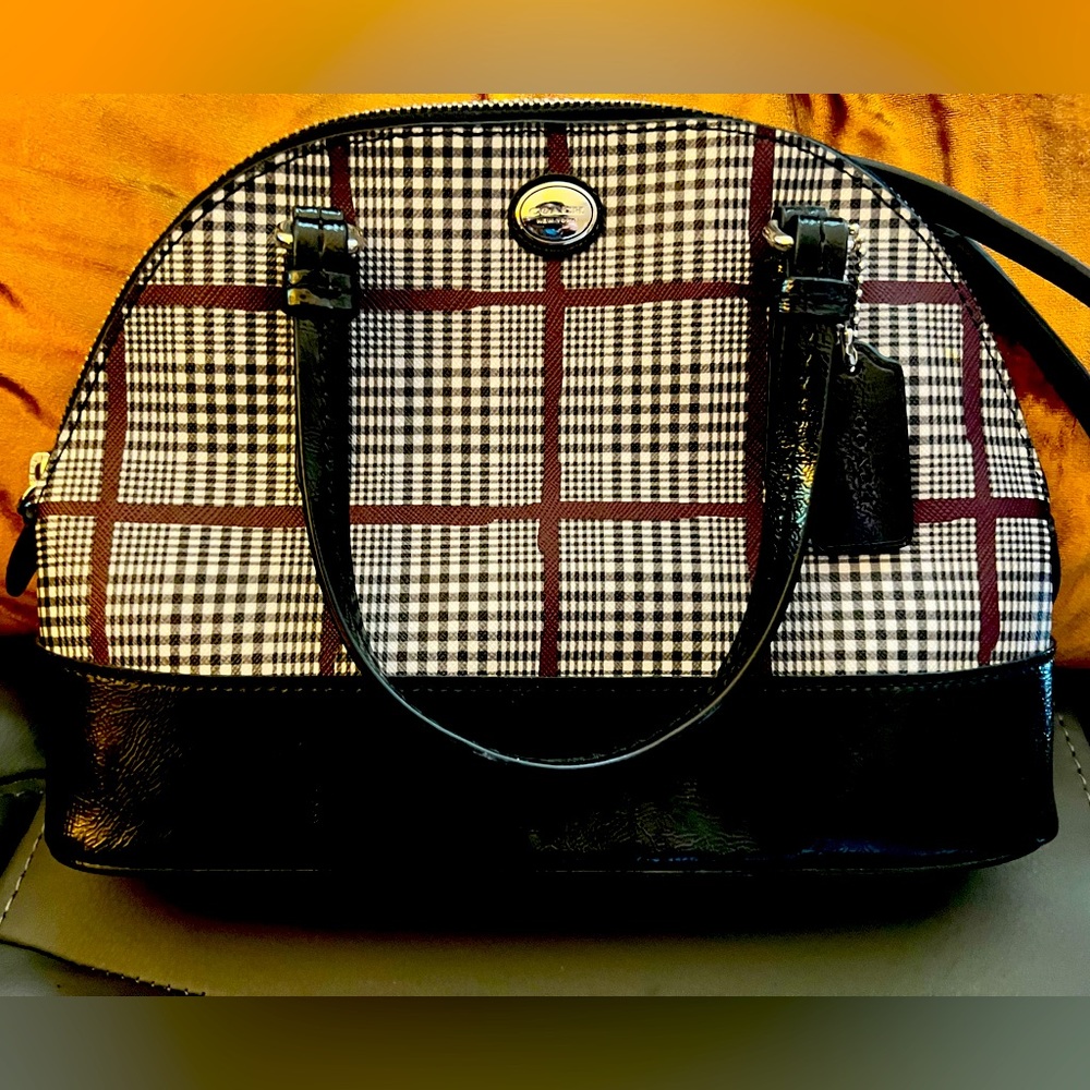 Never worn with tags Coach crossbody bag.